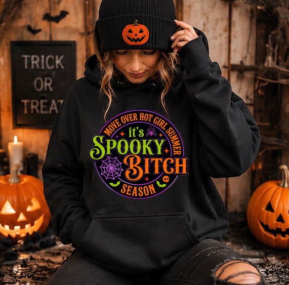 Spooky Bitch Season Halloween graphic hoodie with colorful retro design